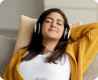 Photo of a woman in a yellow sweater